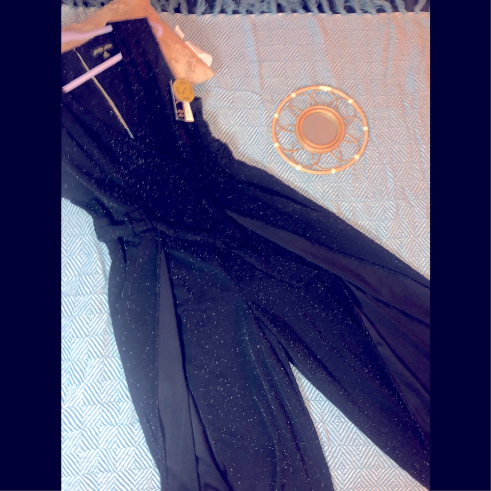 Black with silver shimmer jumpsuit.